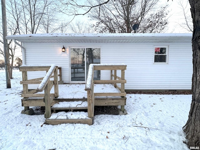 view of snow covered deck