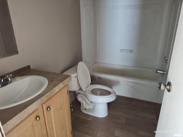 full bathroom featuring vanity, shower / bathtub combination, toilet, and wood-type flooring