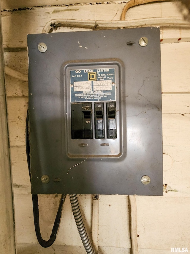 utility room featuring electric panel