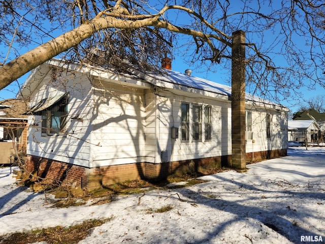 view of snow covered exterior