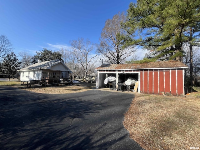 view of home's exterior with a carport