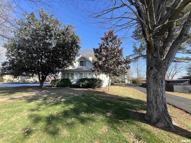 exterior space with a front yard