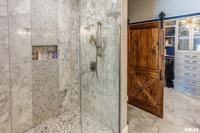 bathroom featuring tiled shower