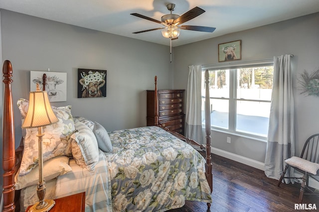 bedroom featuring dark wood-type flooring and ceiling fan