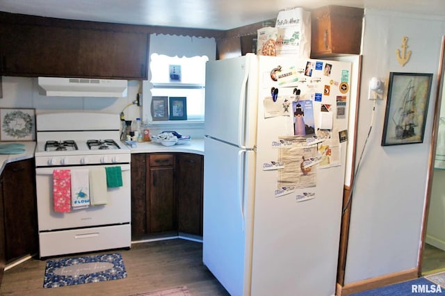 kitchen with dark wood-type flooring, white appliances, and dark brown cabinetry