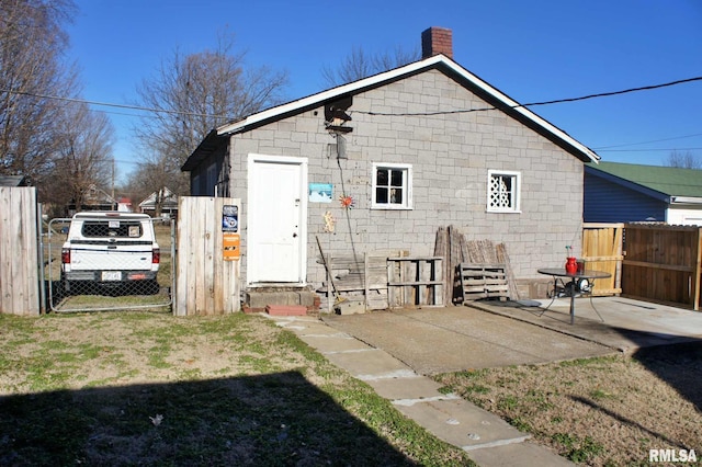 rear view of house featuring a patio