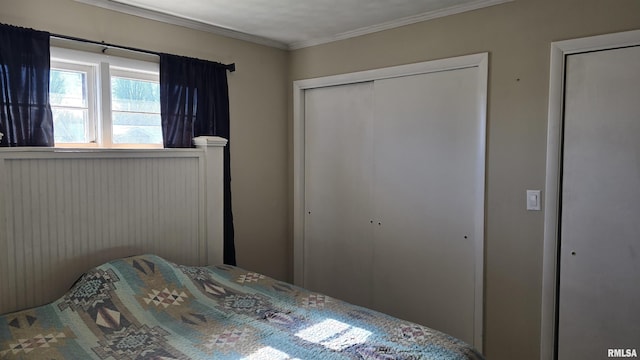 bedroom with ornamental molding