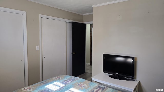 bedroom with crown molding