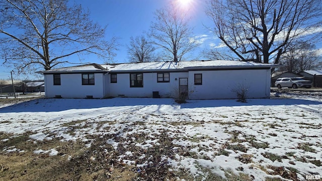 view of snow covered property