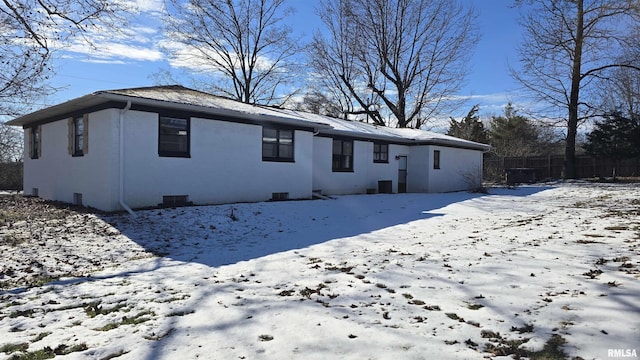 view of snow covered property