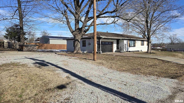 ranch-style house with a garage