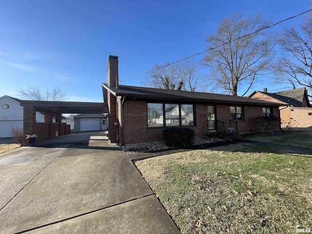 single story home with a garage, a front yard, and a carport