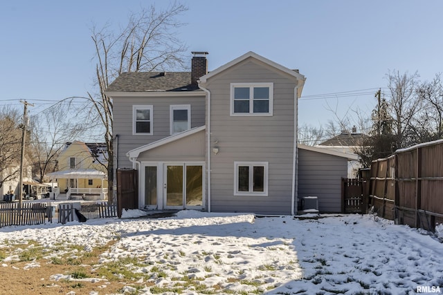 view of snow covered property