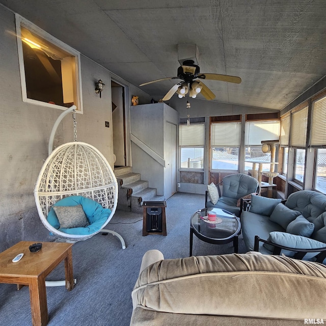 sunroom / solarium featuring ceiling fan and a healthy amount of sunlight