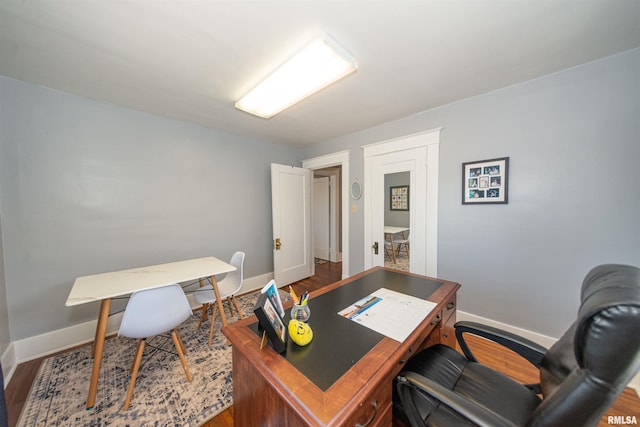 home office featuring hardwood / wood-style flooring