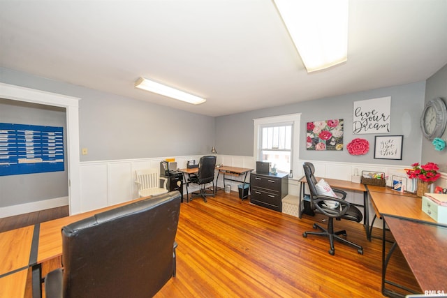 office space with hardwood / wood-style flooring