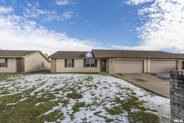 ranch-style home featuring a garage