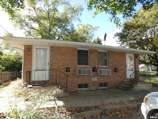 back of house with a patio