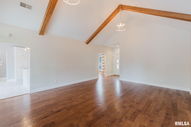 2730 Kokopelli Dr, Marion, IL 62959 - unfurnished living room featuring arched walkways, a chandelier, high vaulted ceiling, beamed ceiling, and wood finished floors