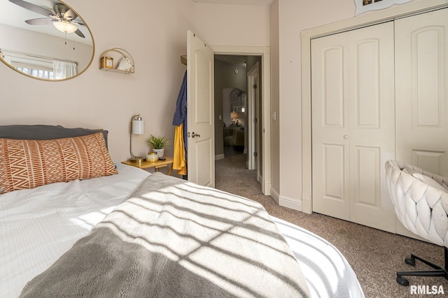 bedroom with ceiling fan, a closet, and carpet