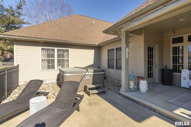 view of patio featuring a hot tub