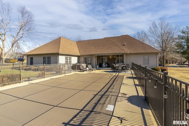 rear view of property with a patio area