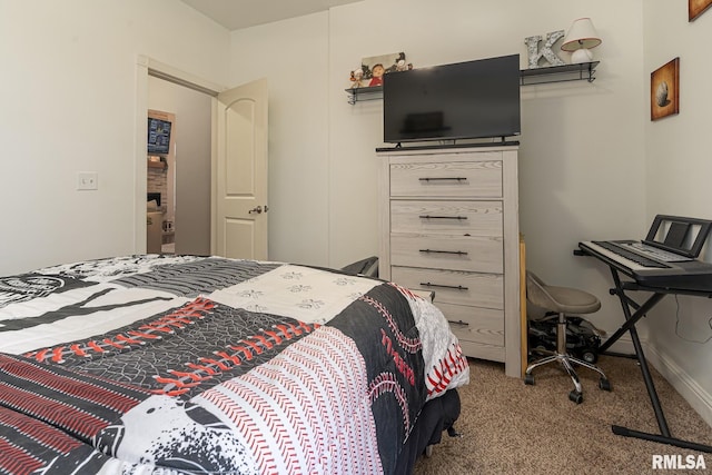 carpeted bedroom with baseboards
