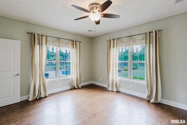 2730 Kokopelli Dr, Marion, IL 62959 - spare room with a ceiling fan, wood finished floors, and baseboards