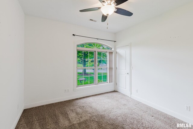 2730 Kokopelli Dr, Marion, IL 62959 - spare room featuring carpet, ceiling fan, and baseboards