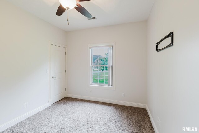 2730 Kokopelli Dr, Marion, IL 62959 - empty room featuring light carpet, baseboards, and a ceiling fan