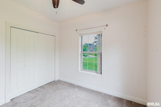 2730 Kokopelli Dr, Marion, IL 62959 - unfurnished bedroom featuring carpet flooring, baseboards, a closet, and ceiling fan