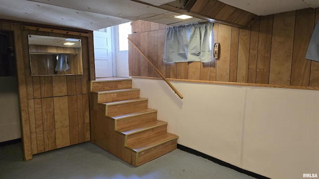 basement with wood walls