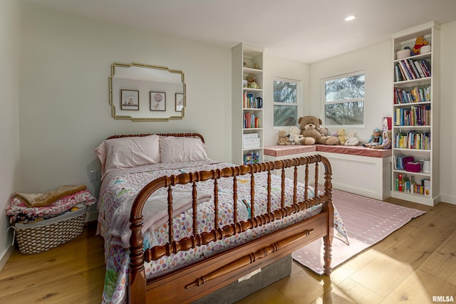 bedroom featuring light wood-type flooring