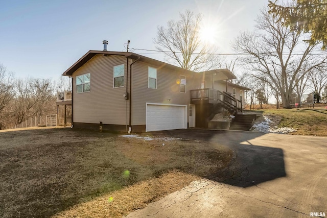 view of home's exterior with a garage