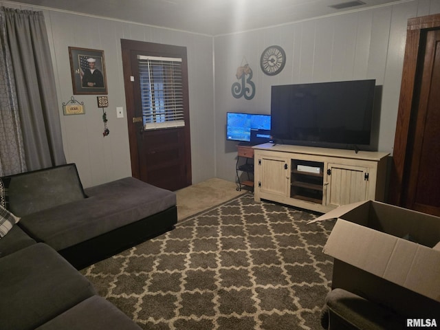 living room featuring wood walls