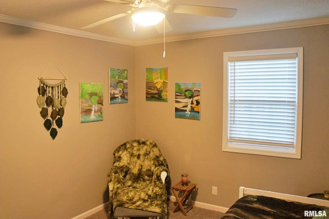 carpeted bedroom with crown molding and ceiling fan