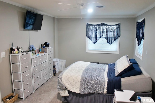 bedroom featuring carpet flooring, ceiling fan, and ornamental molding