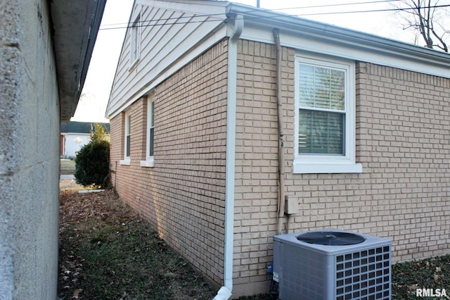 view of property exterior with cooling unit