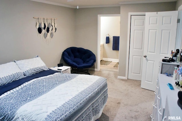 carpeted bedroom featuring crown molding