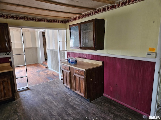 kitchen with dark wood-type flooring