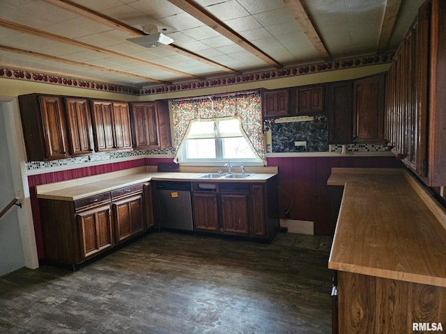 kitchen with dark wood-type flooring, sink, stainless steel dishwasher, and dark brown cabinets