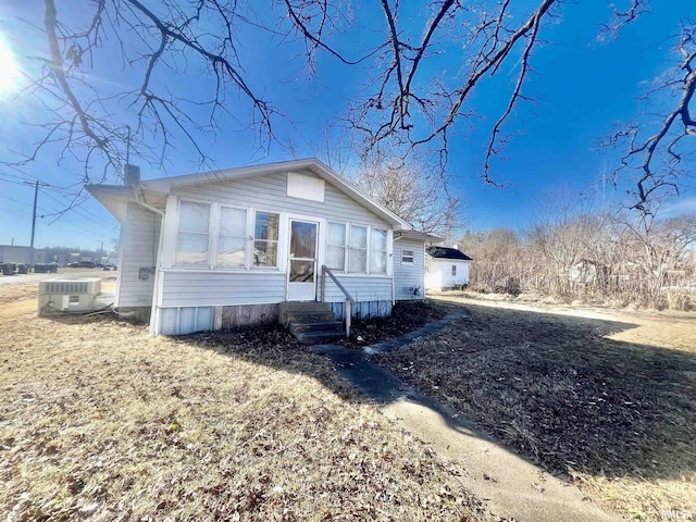 view of front of property with cooling unit