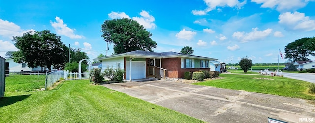 103 David Dr, Mcclure, IL 62957 - view of front facade with a garage, brick siding, and concrete driveway