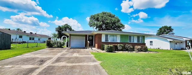 103 David Dr, Mcclure, IL 62957 - ranch-style home with a garage, brick siding, and driveway