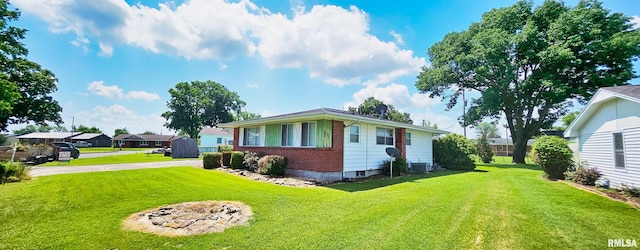 103 David Dr, Mcclure, IL 62957 - view of front of property featuring brick siding, a front yard, and driveway