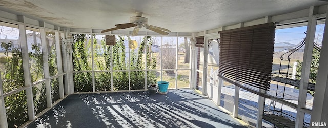 103 David Dr, Mcclure, IL 62957 - unfurnished sunroom with ceiling fan and plenty of natural light
