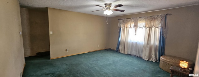 103 David Dr, Mcclure, IL 62957 - spare room featuring carpet, a textured ceiling, and a ceiling fan