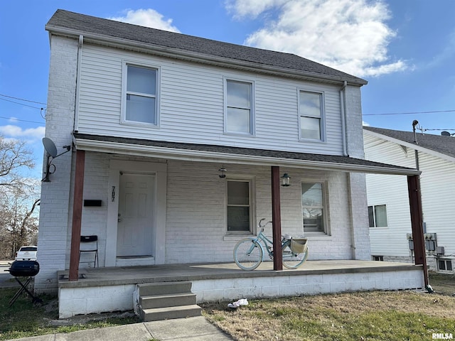 front of property featuring a porch