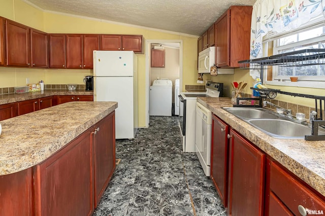 kitchen featuring lofted ceiling, sink, white appliances, and a textured ceiling