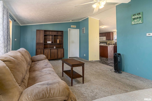 carpeted living room with crown molding, vaulted ceiling, and a textured ceiling